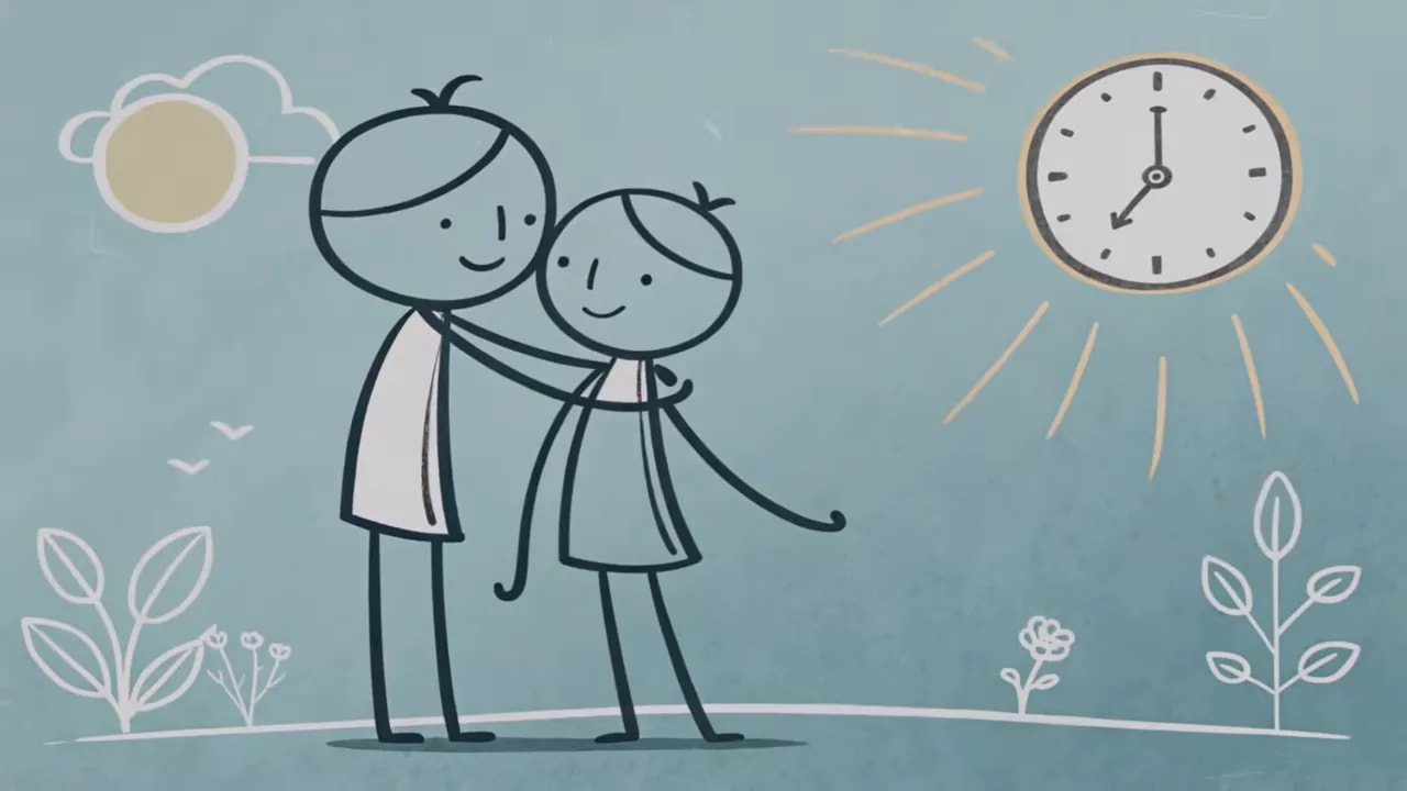 Zwei Personen umarmen sich unter einer Sonne neben einer Uhr